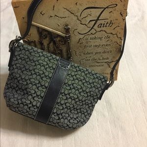 Cute 8x5 1/2 in small navy Coach Bag.